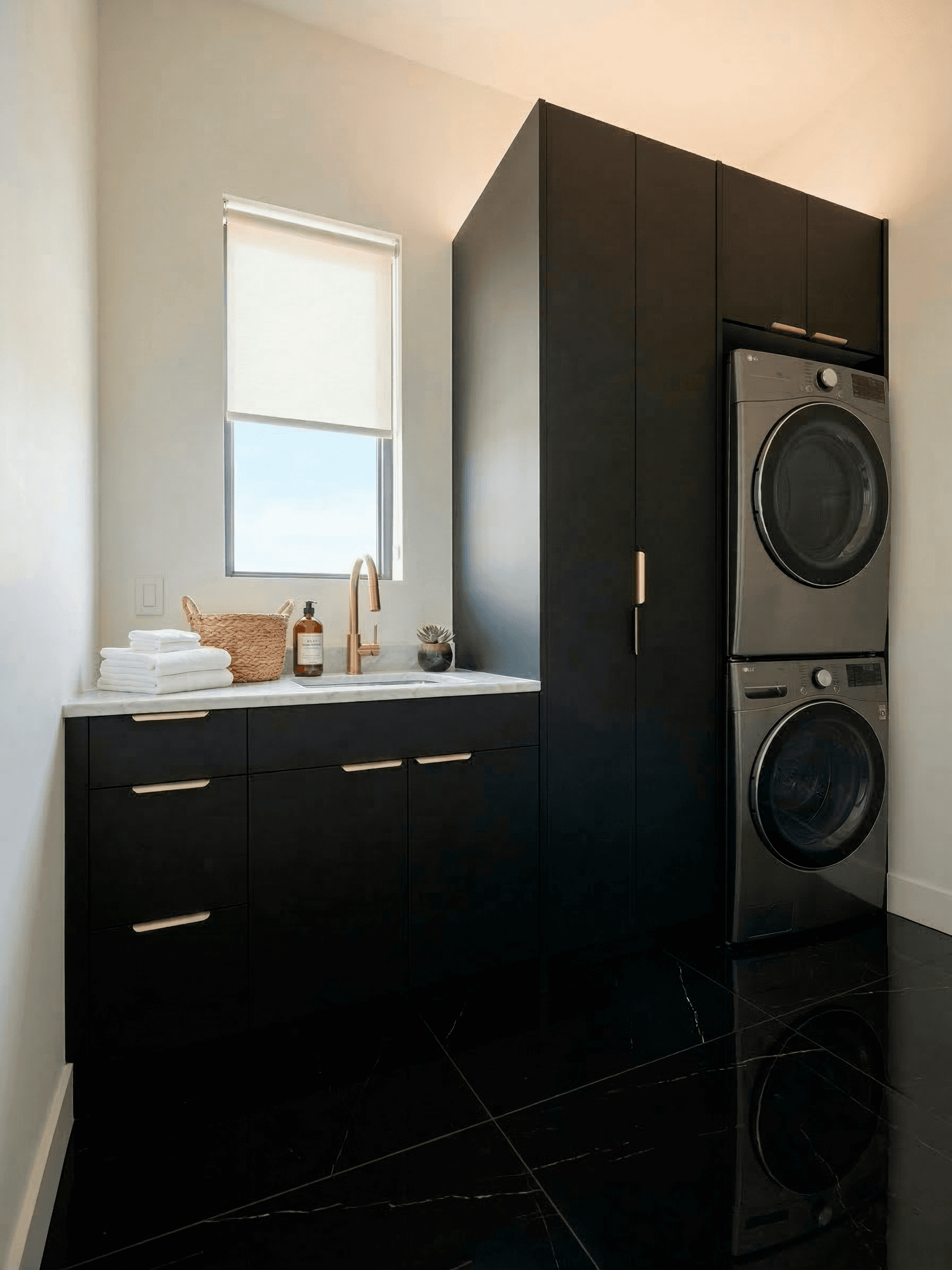 Polished laundry with custom cabinetry