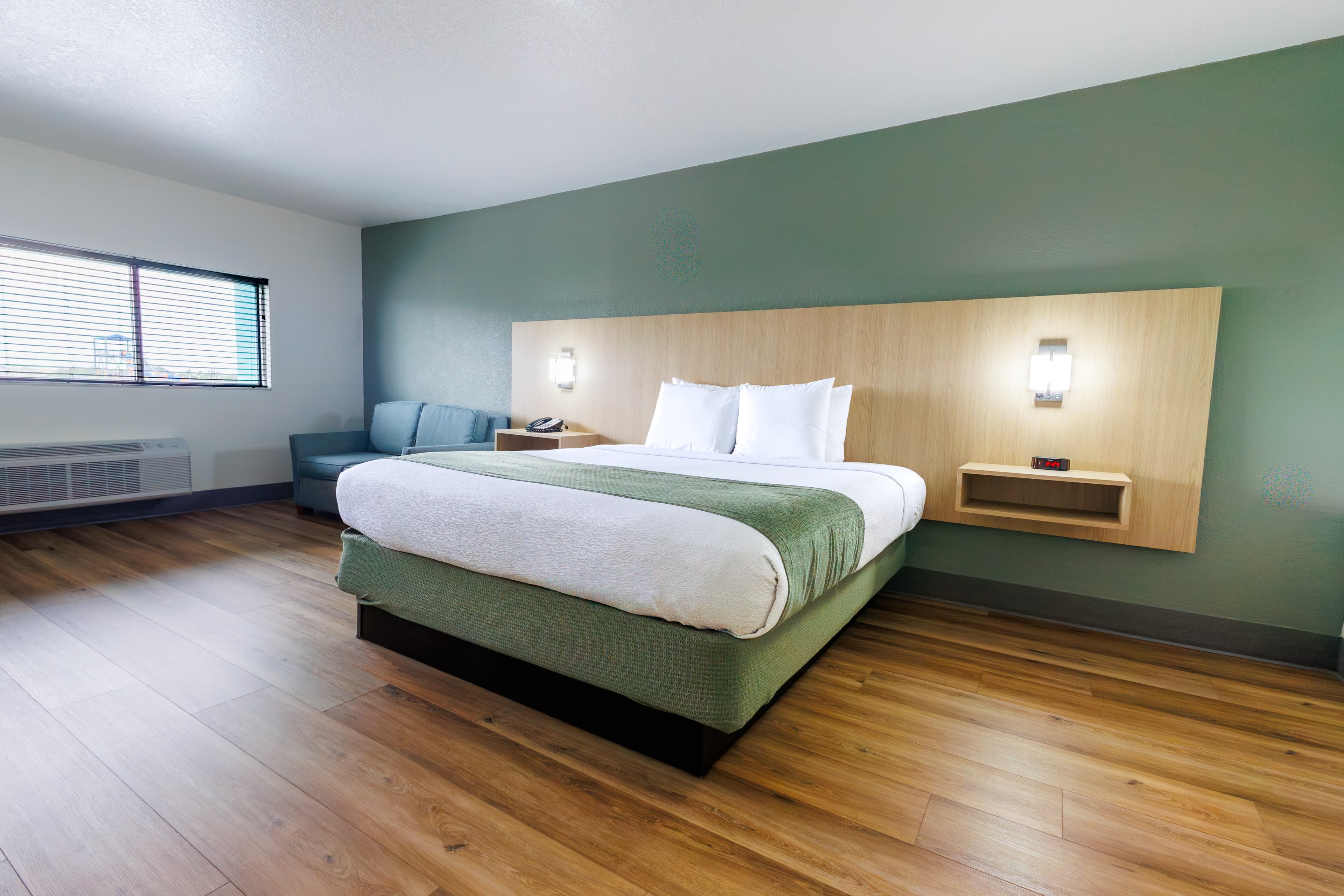 Modern bedroom with custom headboard millwork